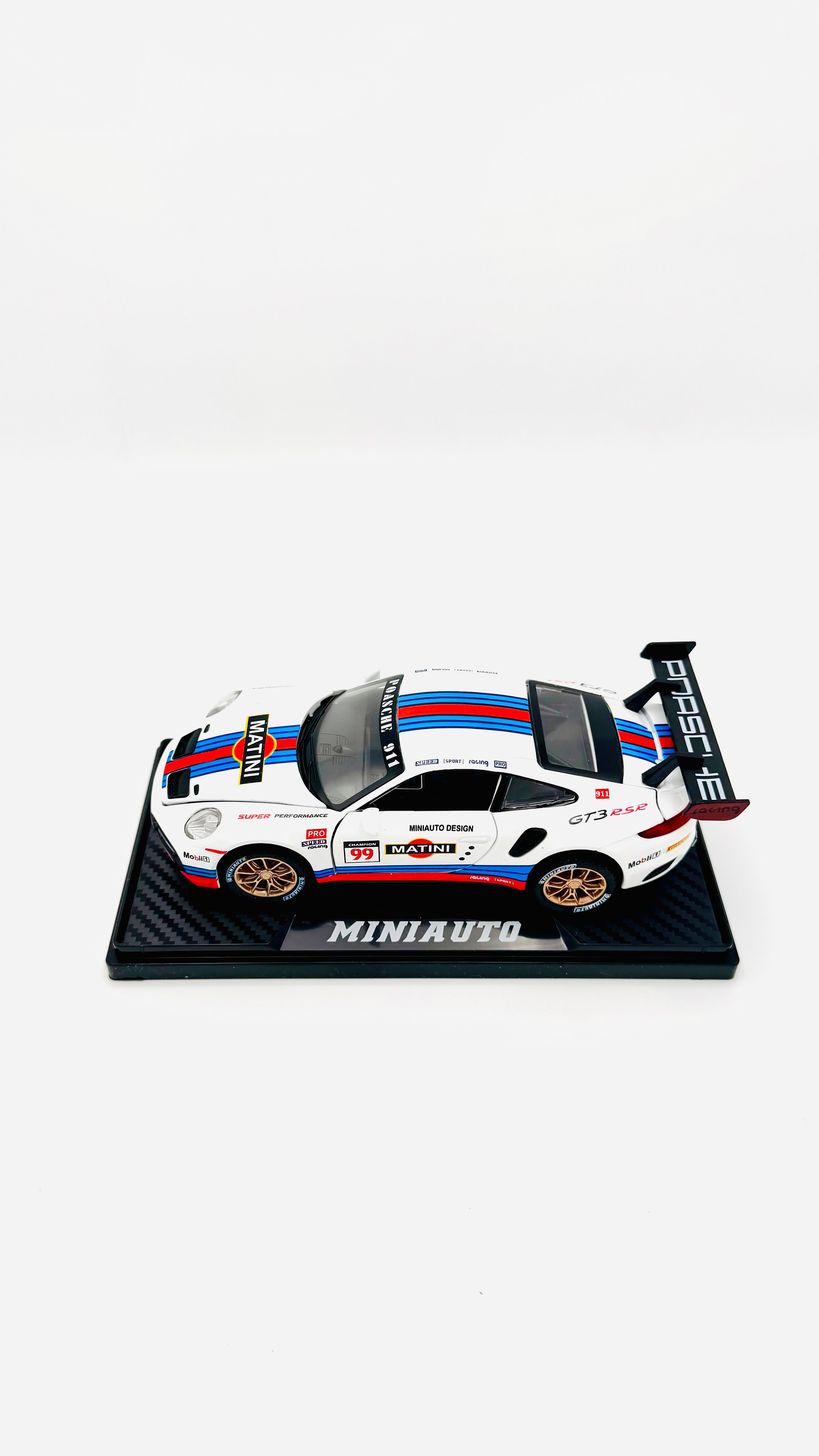 White racing car on display stand, side view