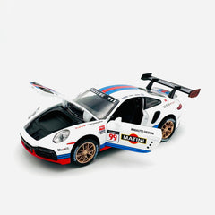 White racing car with bonnet and doors open