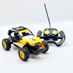 Yellow RC buggy front three-quarter view