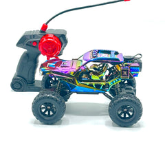 Chrome RC crawler side view showing shock absorbers