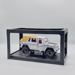 Die-cast SUV side view in display case