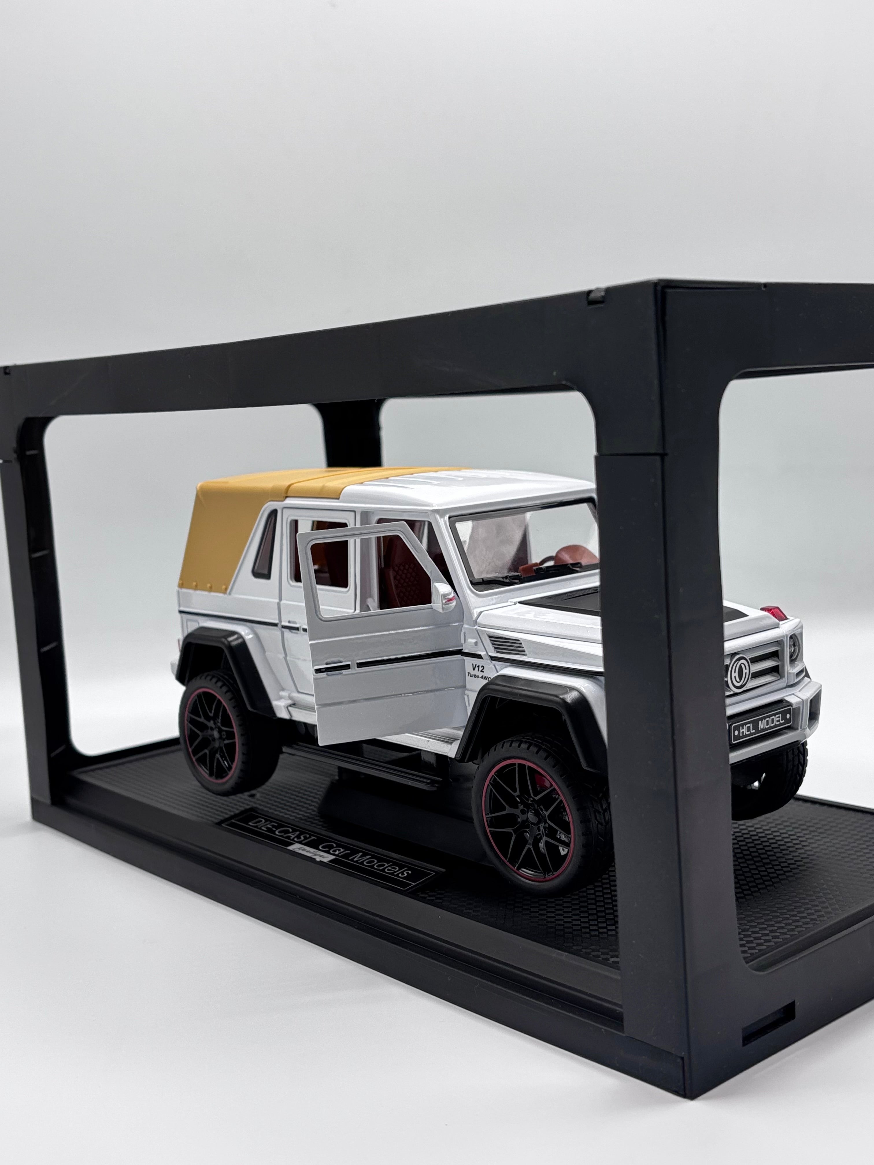 Die-cast SUV in display case, three-quarter view